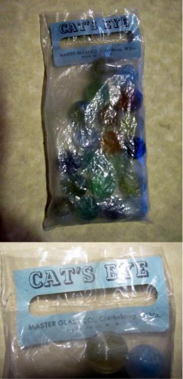MASTER GLASS Cats Eye Marbles in original poly bag Pre-1973.jpg